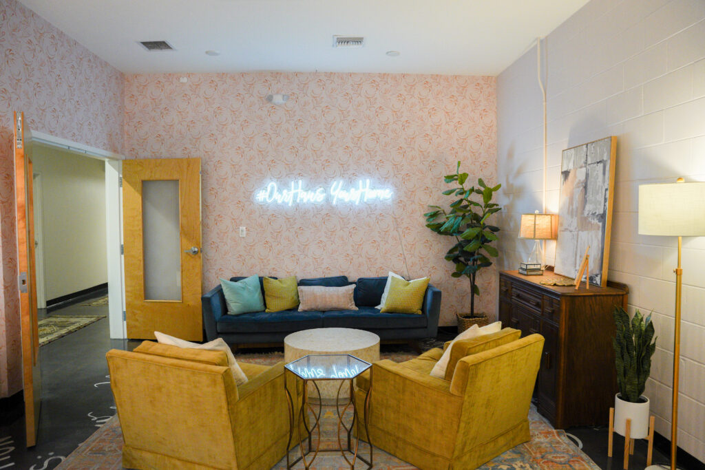 Bridal suite with blue and yellow chairs 