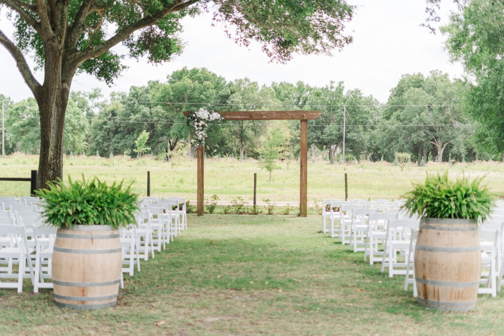 ceremony with white chairs