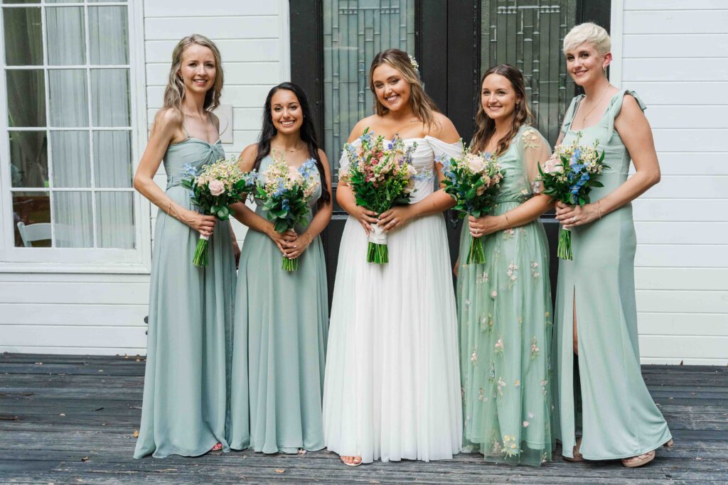 bride with her bridesmaids 