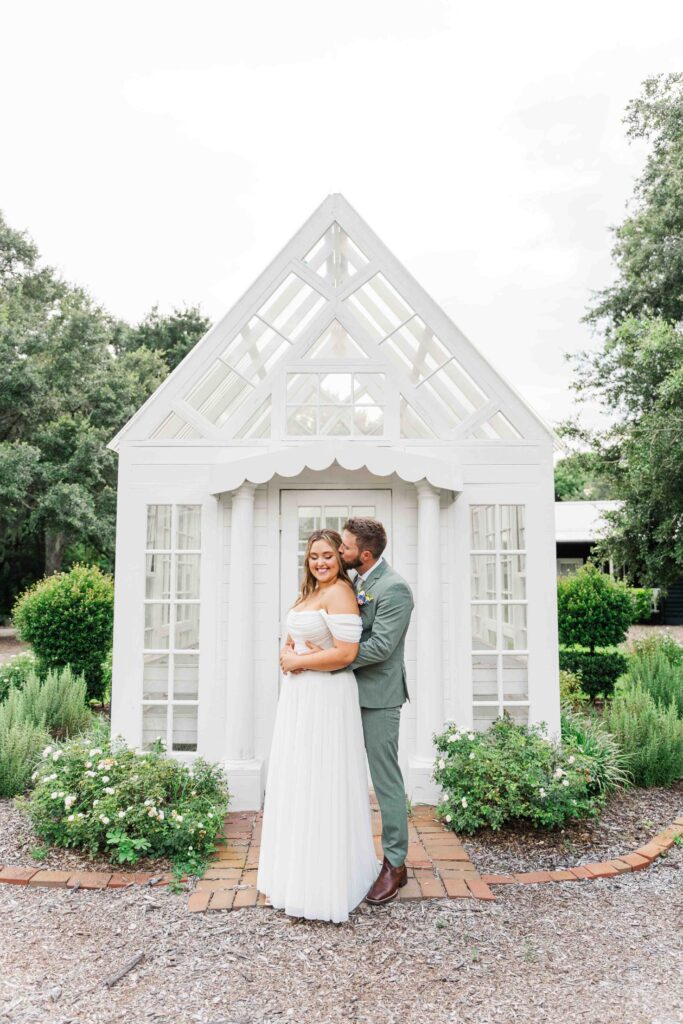 bride and groom cuddling just married 