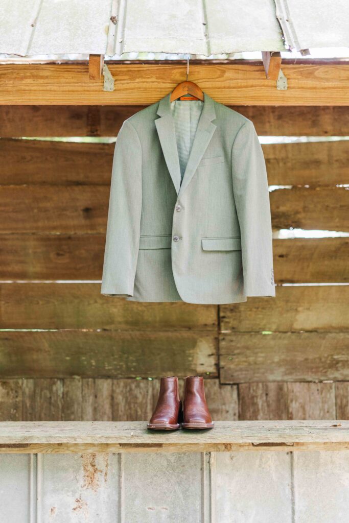 detail shot of the grooms suite and shoes